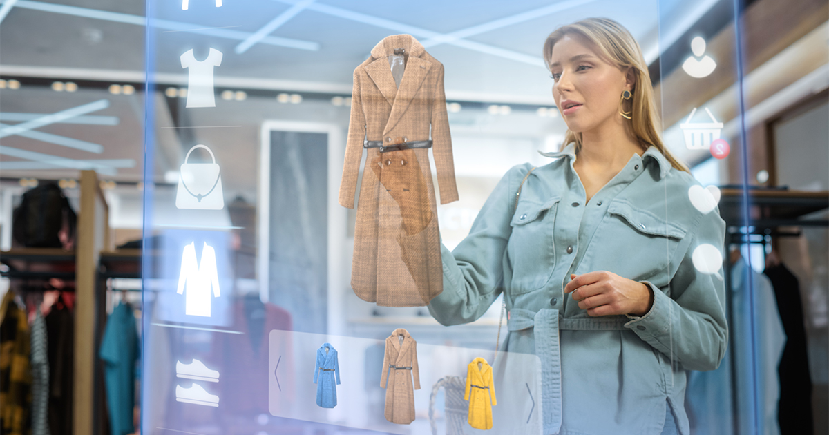 Woman using interactive digital retail screen to browse personalized fashion options in a modern apparel store.