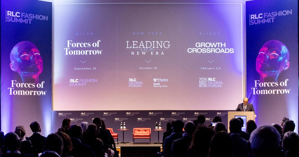 Photo of the audience, stage and screen at the RLC Fashion Summit in Milan