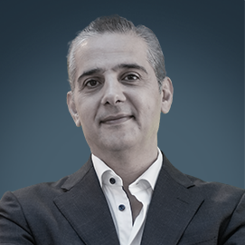 Fahed Ghanim – CEO, Majid Al Futtaim Lifestyle | RLC Global Forum Fahed Ghanim, CEO of Majid Al Futtaim – Lifestyle, in a dark suit with arms crossed, smiling slightly.