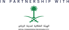 In partnership with: palm tree logo with roots, with Arabic text beneath beneath the logo