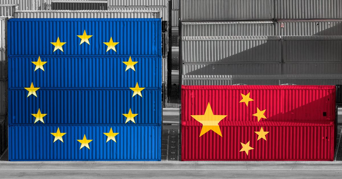 Shipping containers painted with the European Union flag and Chinese flag side by side at RLC Global Forum.